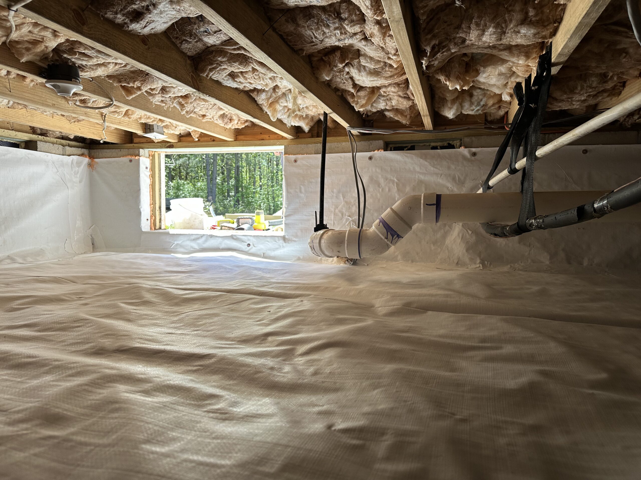 Crawlspace vapor barrier and access area