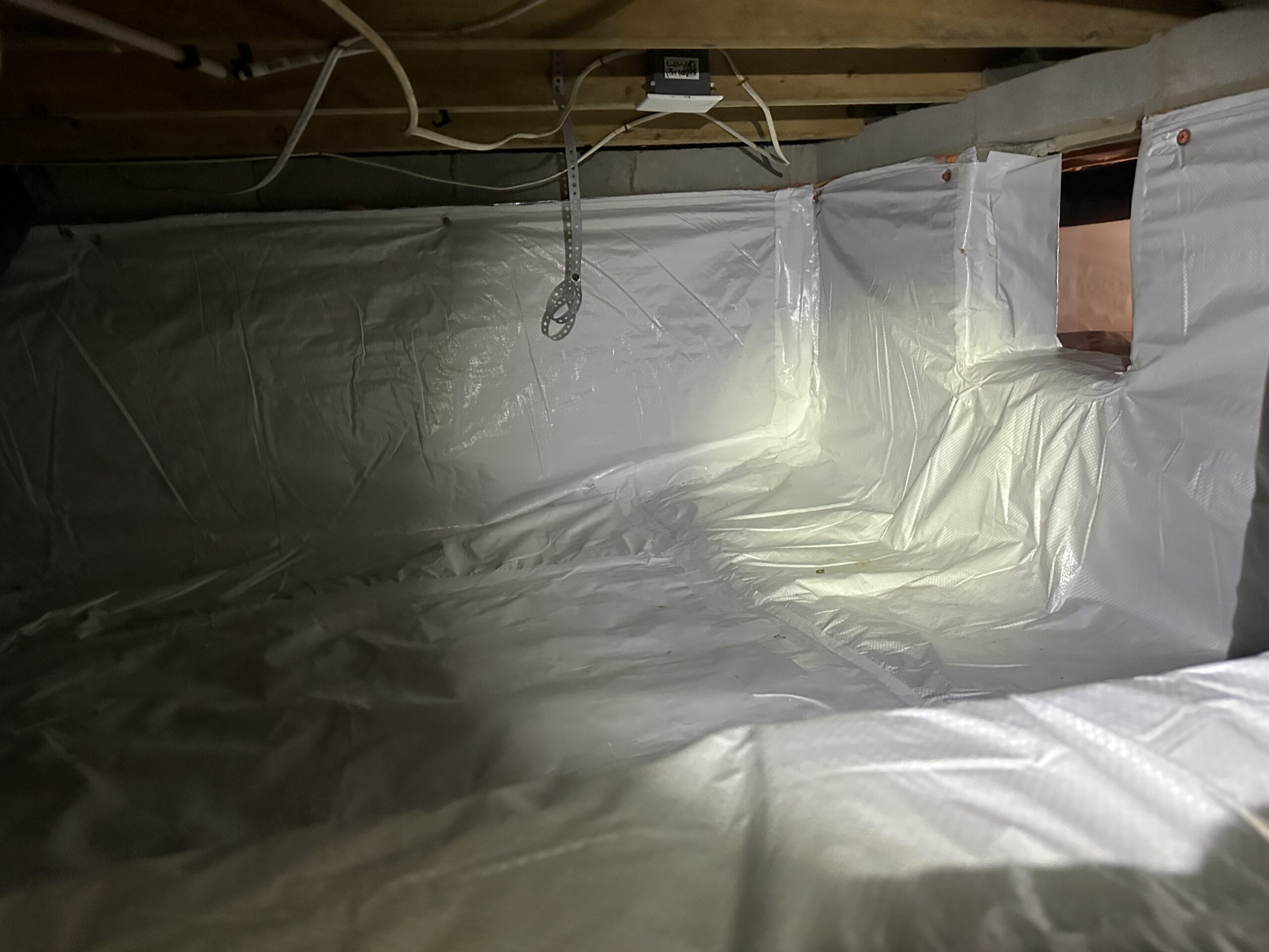 After crawlspace encapsulation with full vapor barrier